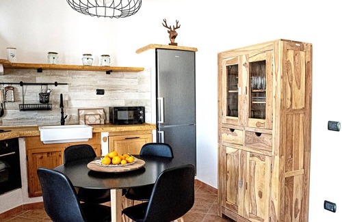Alghero Casa | Casa de vacaciones 'Giulia' con piscina compartida, Wi-Fi y aire acondicionado