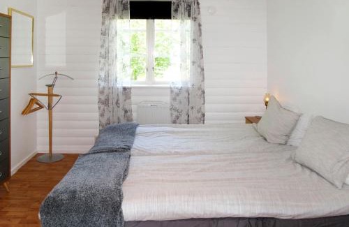 Asarum Casa | Holiday Home Hoka Stugan - B
