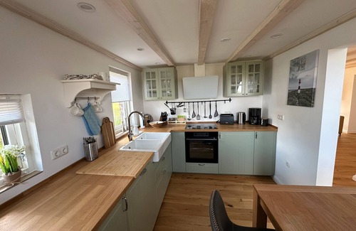 Norden Casa | Holiday Home 'Huus Ant Diek with Pool' with Private Terrace, Private Garden and Wi-Fi