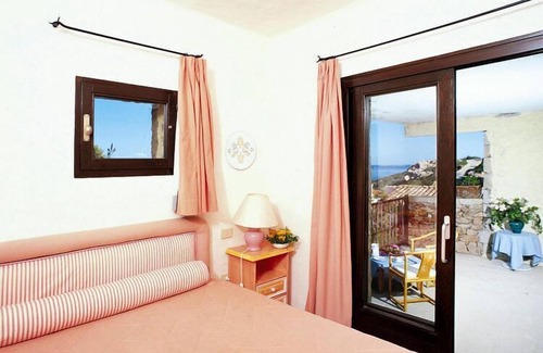 Baja Sardinia Apartamento | Apartamento en Baja Sardinia con recepciones
