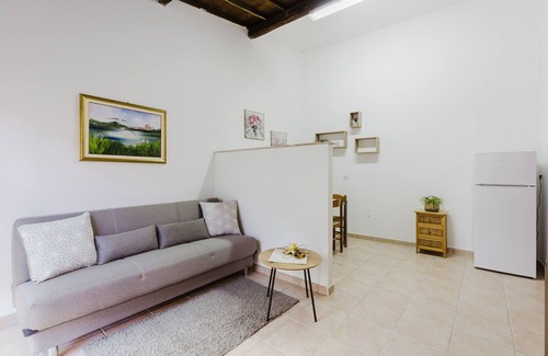 Palmas Arborea Casa | Casa de vacaciones 'Apartamento Il Corbezzolo' con terraza compartida, Wi-Fi y aire acondicionado