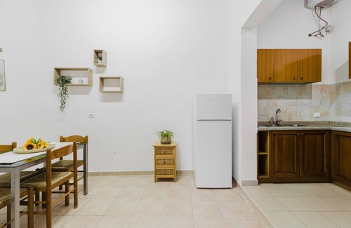 Palmas Arborea Casa | Casa de vacaciones 'Apartamento Il Corbezzolo' con terraza compartida, Wi-Fi y aire acondicionado