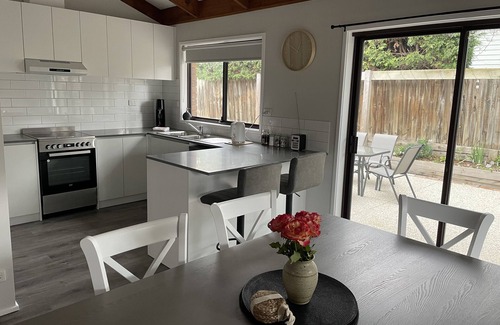 Rhyll Casa | Holiday home in quiet fishing village with facilities & attractions close by.