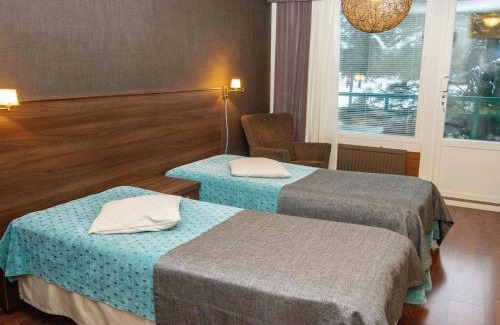 Ikaalinen Casa | Holiday Home Kylpylä-hotelli- kekkosen sviitti- room by Interhome