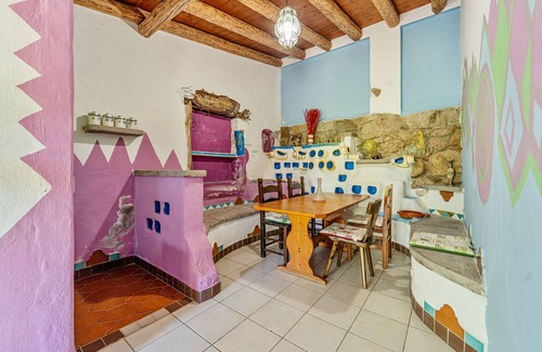 Arbus Casa | Casa de vacaciones "La Quercia" con vistas a la montaña, terraza y jardín compartido