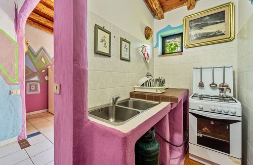 Arbus Casa | Casa de vacaciones "La Quercia" con vistas a la montaña, terraza y jardín compartido