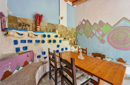 Arbus Casa | Casa de vacaciones "La Quercia" con vistas a la montaña, terraza y jardín compartido