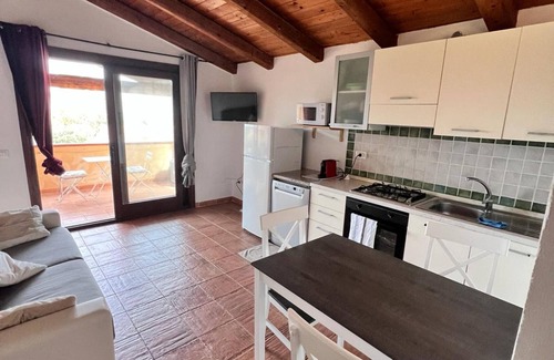 Baia Caddinas Casa | Casa de vacaciones 'Orizzonti 32' con vistas al mar y terraza privada