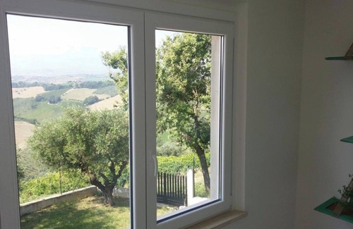 Offida Casa | Casa de vacaciones 'Palme e Vigne' con terraza privada, jardín compartido y Wi-Fi