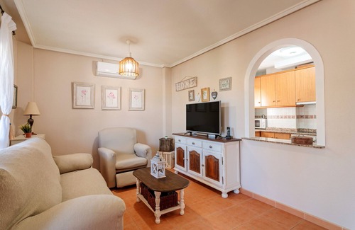 Los Arenales del Sol Casa | Casa de vacaciones 'Playa Carabassi' con piscina compartida, terraza privada y Wi-Fi