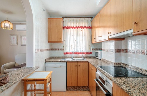 Los Arenales del Sol Casa | Casa de vacaciones 'Playa Carabassi' con piscina compartida, terraza privada y Wi-Fi