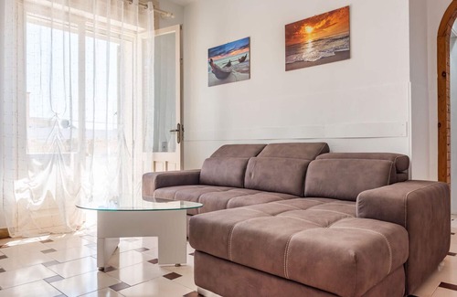 Torre Mozza Casa | Holiday Home 'Primo Piano Vista Mare' with Private Terrace and Air Conditioning