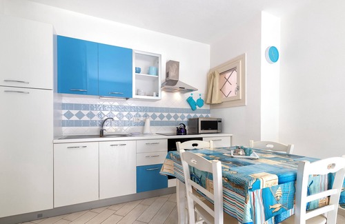 Viddalba Casa | Casa de vacaciones 'Romantica Casa Al Mare' con piscina compartida, Wi-Fi y aire acondicionado