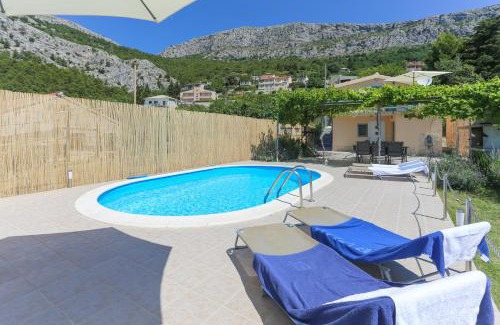 Solin Casa | Holiday Home Rupotina with a large yard, pool and a beautiful view