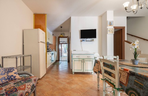 Porto Pino Casa | Casa vacacional 'Sole E Mare' con terraza privada, jardín privado y aire acondicionado