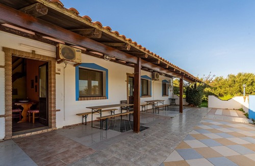 Gonnesa Casa | Casa de vacaciones "Su Cuili" con vistas a la montaña, piscina compartida y aire acondicionado