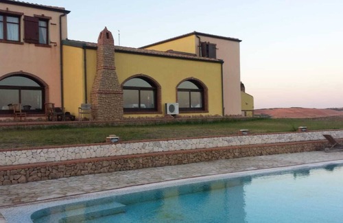 Gonnesa Casa | Casa de vacaciones "Su Cuili" con vistas a la montaña, piscina compartida y aire acondicionado