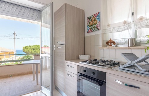 Gallina Casa | Casa de vacaciones "Villa Clara" con vistas al mar, terraza cubierta y jardín