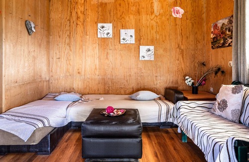 Paliki Casa | Casa de vacaciones "Casa de madera" con vistas a la montaña y jardín