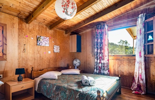 Paliki Casa | Casa de vacaciones "Casa de madera" con vistas a la montaña y jardín