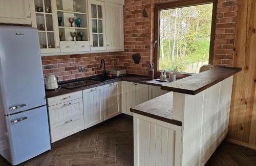 Szczecinek Casa | Holiday homes with a private beach on the lake