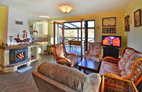 gmina Manowo Casa | Holiday house by the lake with a fireplace