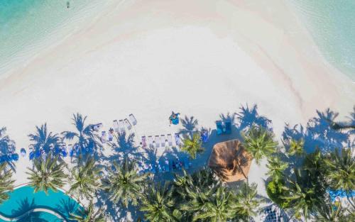 Kandooma Complejo | Holiday Inn Resort Kandooma Maldives - Kids Stay & Eat Free and Free Roundtrip Speed Boat for a minimum 4 nights stay