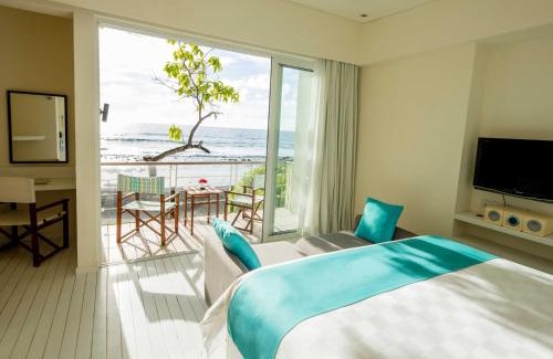 Kandooma Complejo | Holiday Inn Resort Kandooma Maldives - Kids Stay & Eat Free and Free Roundtrip Speed Boat for a minimum 4 nights stay