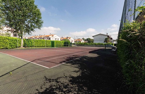 Porto Santa Margherita Casa | Casa vacacional con piscina comunitaria y pista de tenis