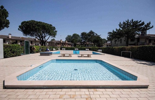 Porto Santa Margherita Casa | Casa vacacional con piscina comunitaria y pista de tenis