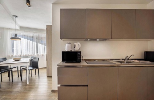 Mareo Apartamento | Apartamento vacacional "Dui Residenz Bun Sté" con vistas a la montaña, jacuzzi y jardín