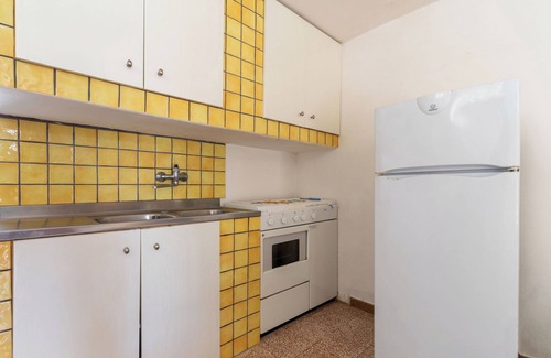 Torre Specchia Ruggeri Apartamento | Apartamento vacacional "Monolocale Amare 2" cerca de la playa con jardín