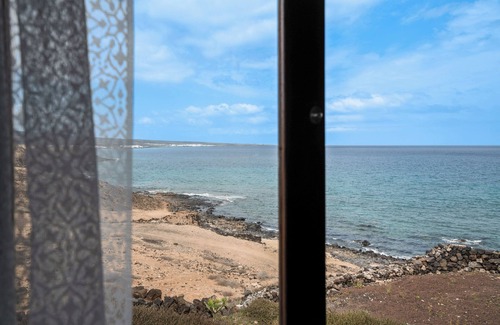 Haria Villa | Villa de vacaciones 'Playa Marina Eco Beach' con vistas al mar, piscina compartida y Wi-Fi