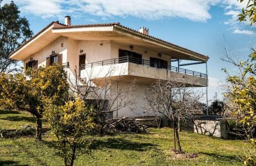 Tanagra Casa | Holiday villa with sea view in Paralia Avlidas