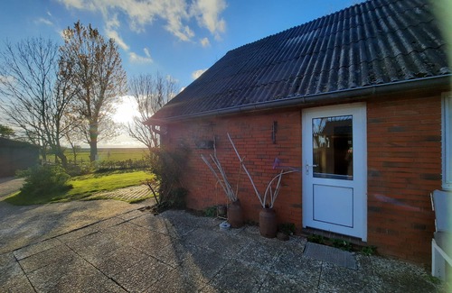 Hattstedtermarsch Apartamento | Vacaciones directamente detrás del dique en el apartamento en el Ferienhof Kohn