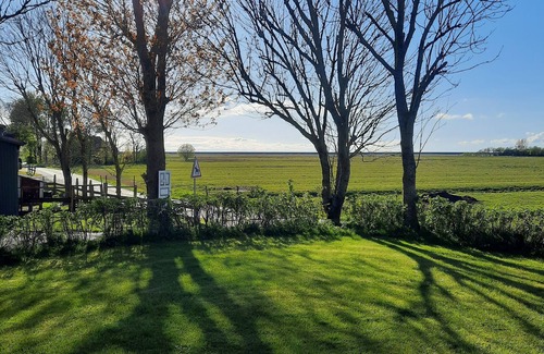 Hattstedtermarsch Apartamento | Vacaciones directamente detrás del dique en el apartamento en el Ferienhof Kohn