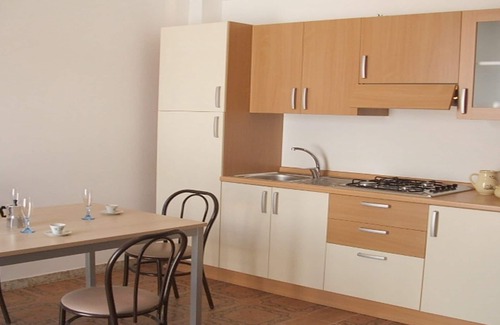Marina di Ostuni Apartamento | Apartamento junto al mar con terraza en Ostuni: Pase las vacaciones en la Casa Azul