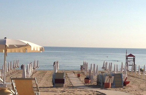 Marina di Ostuni Apartamento | Apartamento junto al mar con terraza en Ostuni: Pase las vacaciones en la Casa Azul