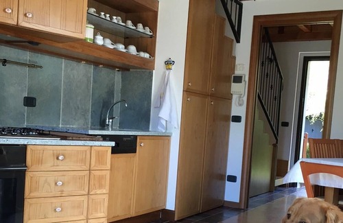 Songavazzo Casa | HOME FALECCHIO con piscina en el verde de las montañas de Orobiche