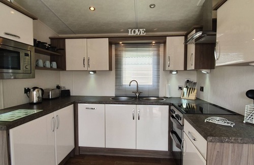 Hopton Chalet De Esquí | Home from Home caravan in Lowestoft