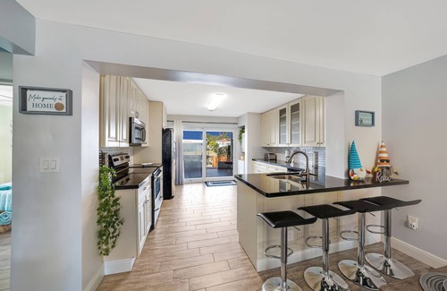 Melaleuca Gardens Casa | Home on Canal Unit B by PMI