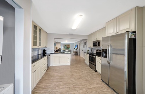 Melaleuca Gardens Casa | Home on Canal Unit B by PMI