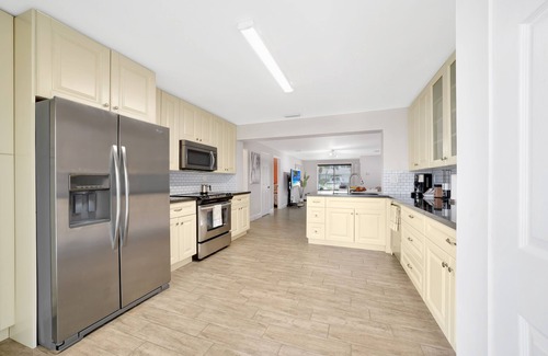 Melaleuca Gardens Casa | Home on Canal unit A by PMI