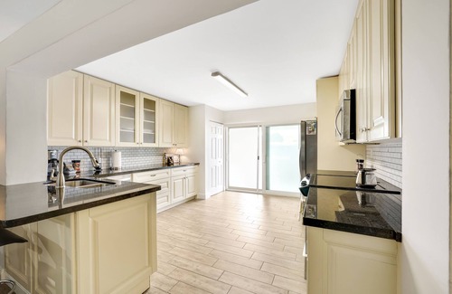 Melaleuca Gardens Casa | Home on Canal unit A by PMI