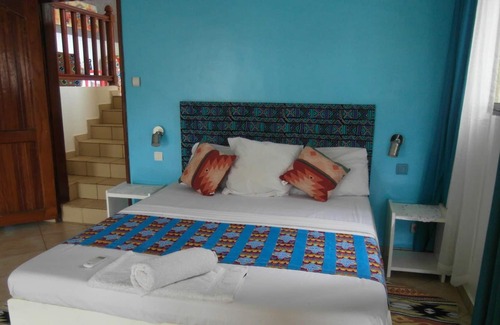 Grand Popo Apartamento | Homerez - 10 m away from the beach! Nice studio for 2 ppl. with shared pool