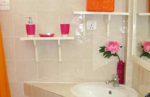 Grand-Baie Apartamento | Homerez - ¡A 300 m de la playa! Apartamento para 4 pers. con piscina y jardín