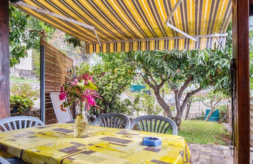 Plateau-Caillou Casa | Homerez - Bungaló a 8 km de la playa para 2 pers. con jardín en Saint Paul