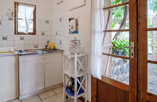 Plateau-Caillou Casa | Homerez - Bungaló a 8 km de la playa para 2 pers. con jardín en Saint Paul