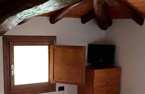 Monte San Pietro Apartamento | Homerez - Bonito apartamento para 4 pers. con piscina compartida y spa