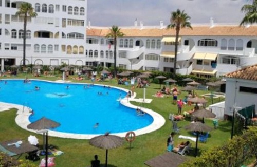 El Portil Apartamento | Homerez - Apartamento a 1 km de la playa para 6 pers. con piscina compartida